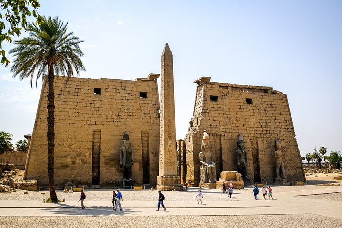 Luxor by Plane: Travelers exploring the ancient temples and tombs in Luxor.
