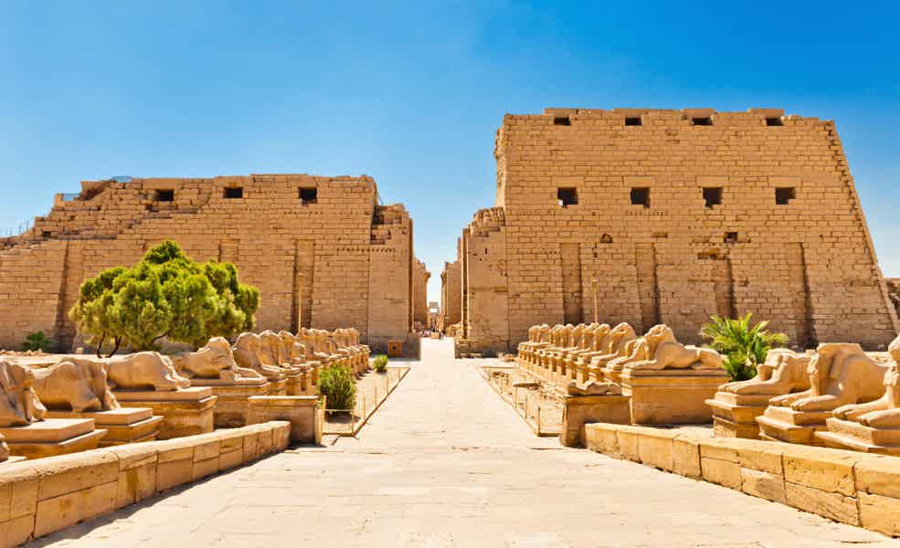 Luxor by Plane: Travelers exploring the ancient temples and tombs in Luxor.  