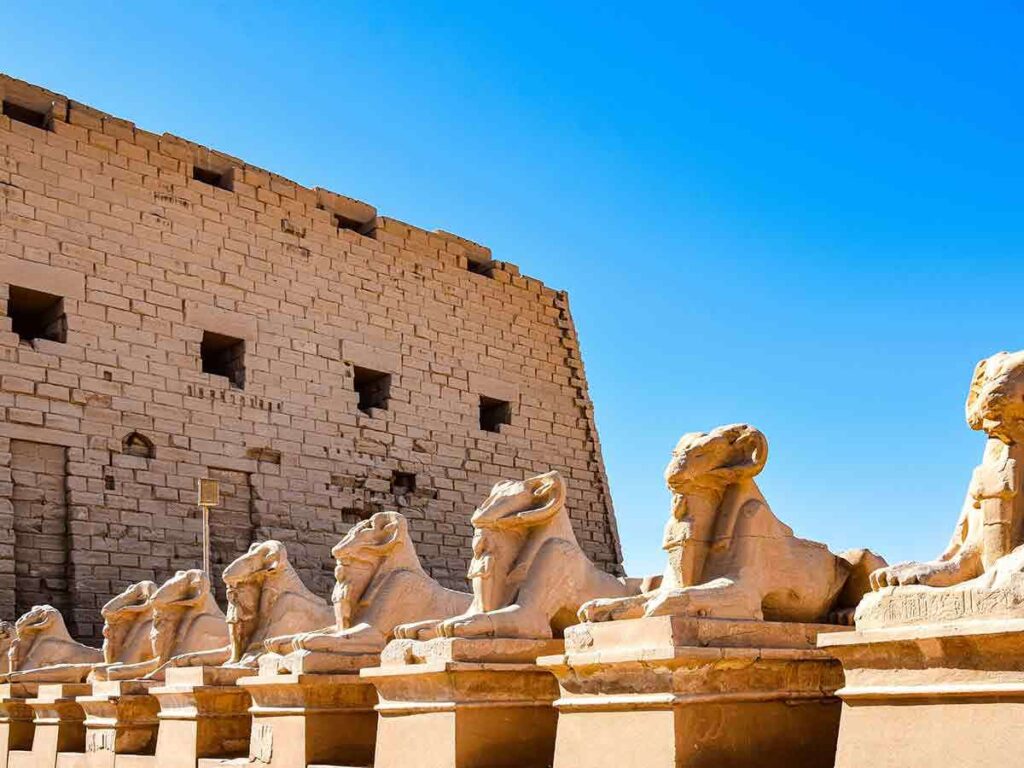 Luxor by Plane: Travelers exploring the ancient temples and tombs in Luxor.
