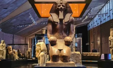 Grand Egyptian Museum GEM exterior with panoramic view of Giza Plateau