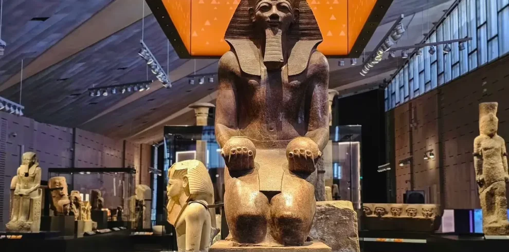 Grand Egyptian Museum GEM exterior with panoramic view of Giza Plateau